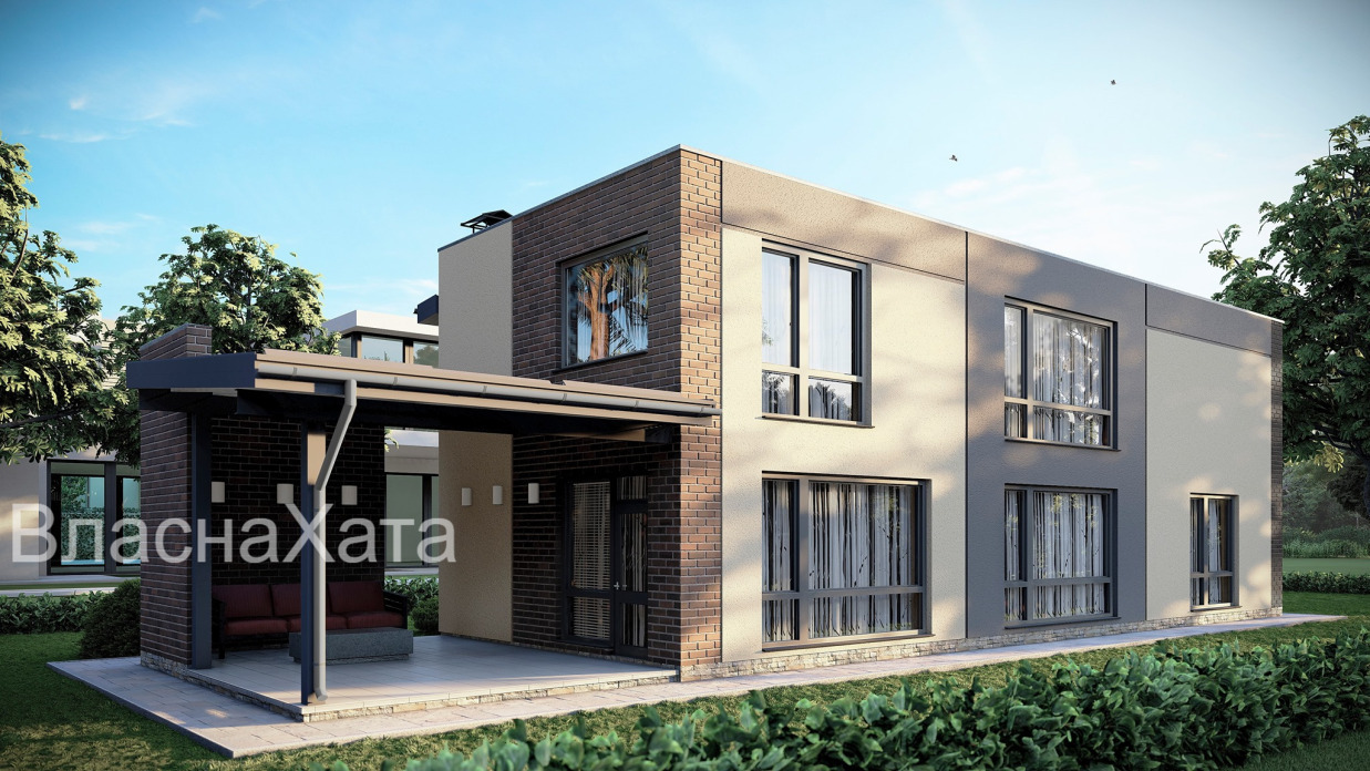 Двоповерховий будинок з сучасним екстер`єром та гаражем